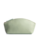 Pistachio Total Eclipse | Spacious leather makeup bag with curved seams and top zipper