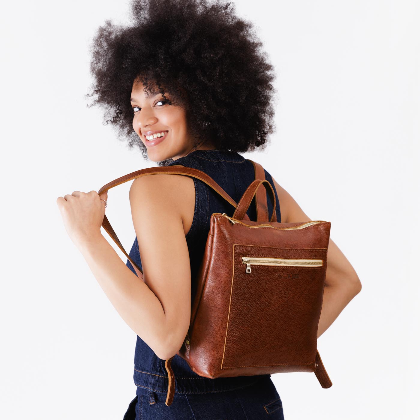 All Color: Nutmeg*Classic | Model wearing square slim leather tote backpack