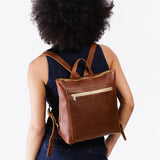 All Color: Nutmeg Classic | Model wearing square slim leather tote backpack