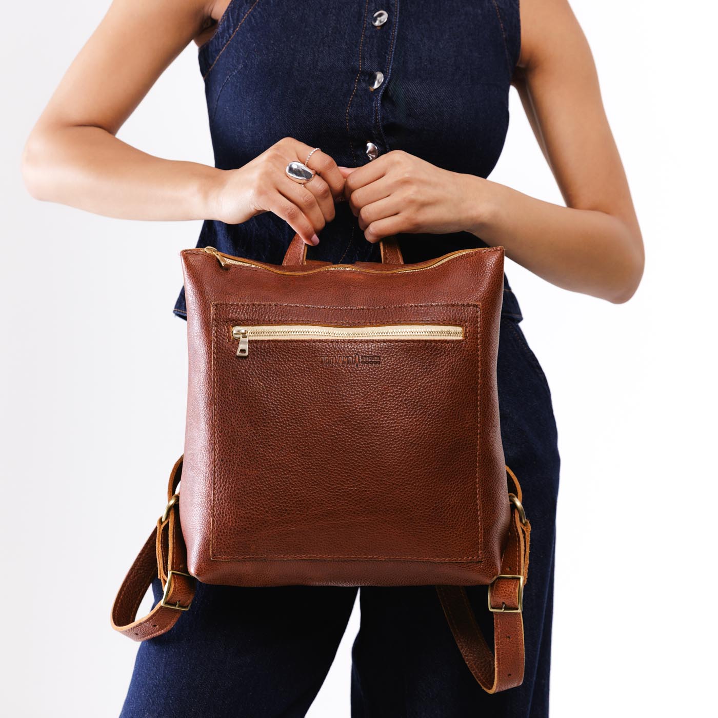 All Color: Nutmeg*Classic | Model wearing square slim leather tote backpack