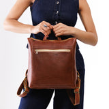 All Color: Nutmeg Classic | Model wearing square slim leather tote backpack