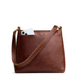 Asheville Classic | Triangular shoulder bag with antiqued brass finished hardware