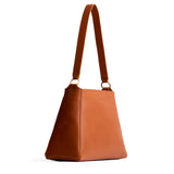 Honey Large | Large triangular shoulder bag with antiqued brass finished hardware