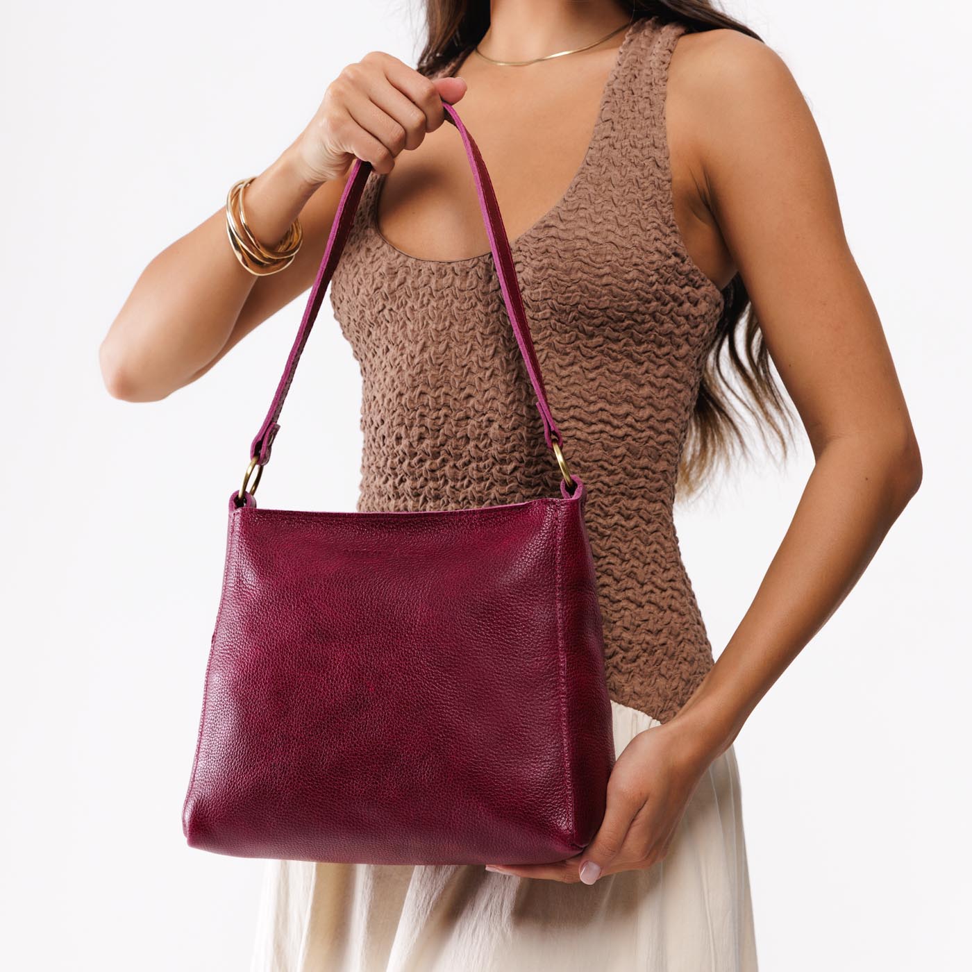 All Variants | Model holding Small Triangle Shoulder Bag