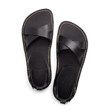 Nero | Flat leather sandals with ankle straps and debossed PLG three tree logo in sole