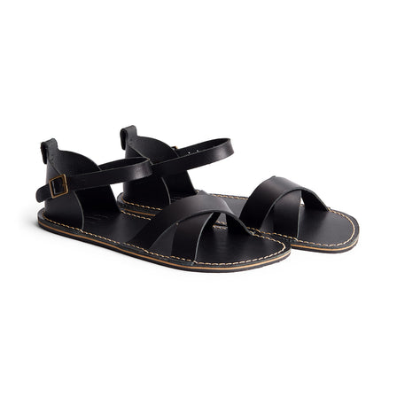 Nero | Flat leather sandals with ankle straps and debossed PLG three tree logo in sole