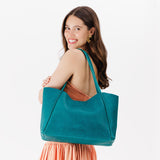 Aquarius Large | Model holding large rectangular tote bag