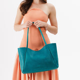 Aquarius Large | Model holding large rectangular tote bag