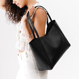 Black Large | Model holding large rectangular tote bag
