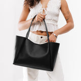 Black Large | Model holding large rectangular tote bag