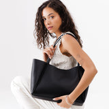 Black Large | Model holding large rectangular tote bag