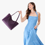 Empire Large | Model holding a large rectangular tote bag
