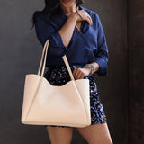 Moonflower Large | Model holding midsize rectangular tote bag