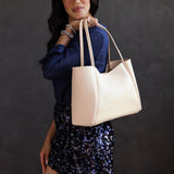Moonflower Large | Model holding midsize rectangular tote bag