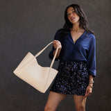 Moonflower Large | Model holding midsize rectangular tote bag