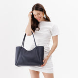Night Owl Large | Model holding large rectangular tote bag