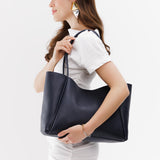 Night Owl Large | Model holding large rectangular tote bag