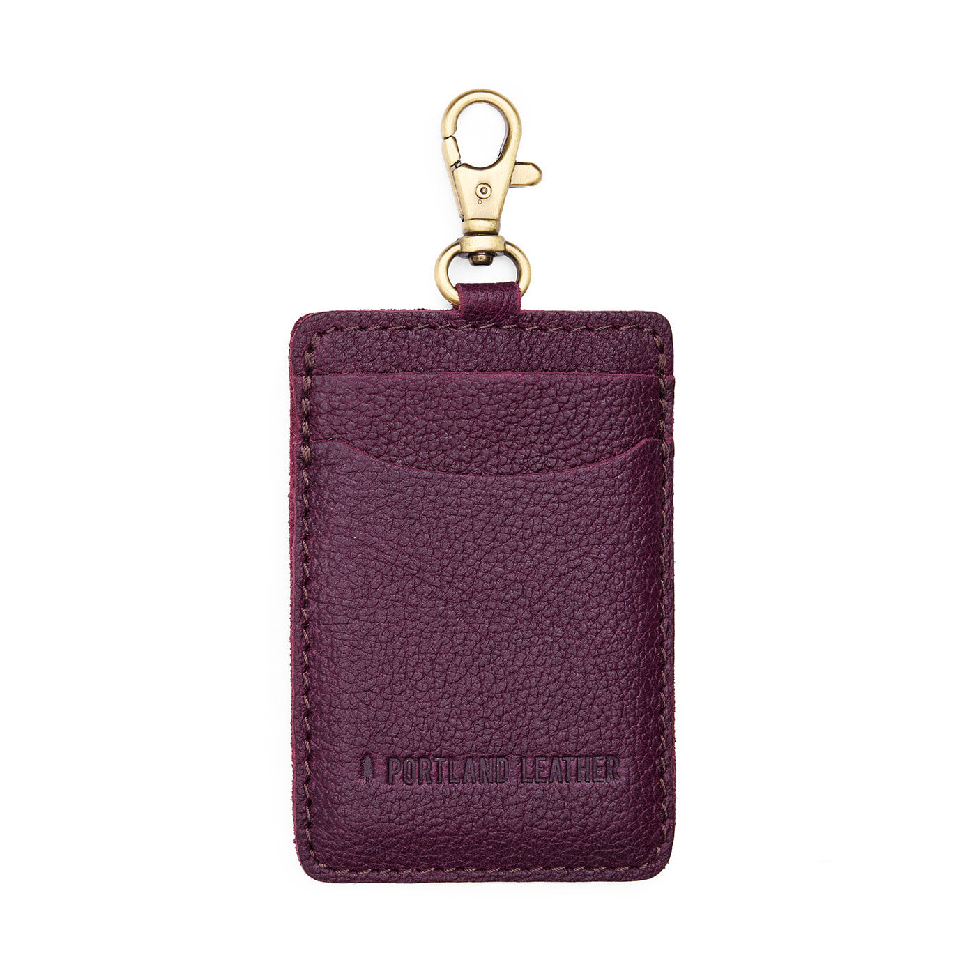 Plum | A leather card holder with a swivel lobster clasp on a white background