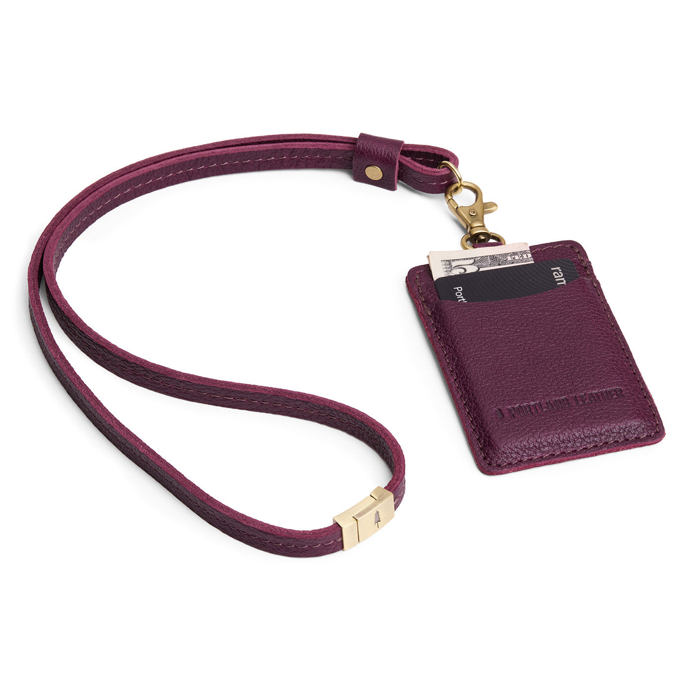 Plum | A leather lanyard attached to a matching card holder on a white background