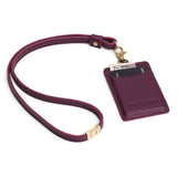 Plum | A leather lanyard attached to a matching card holder on a white background