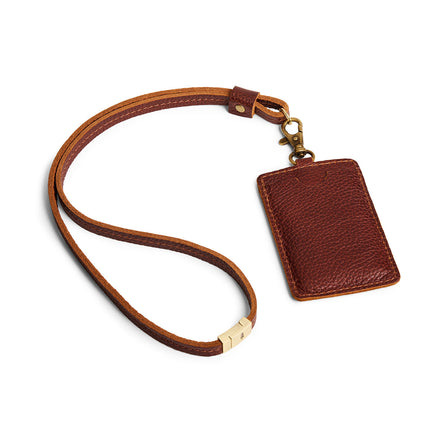 Nutmeg | A leather lanyard attached to a matching card holder on a white background