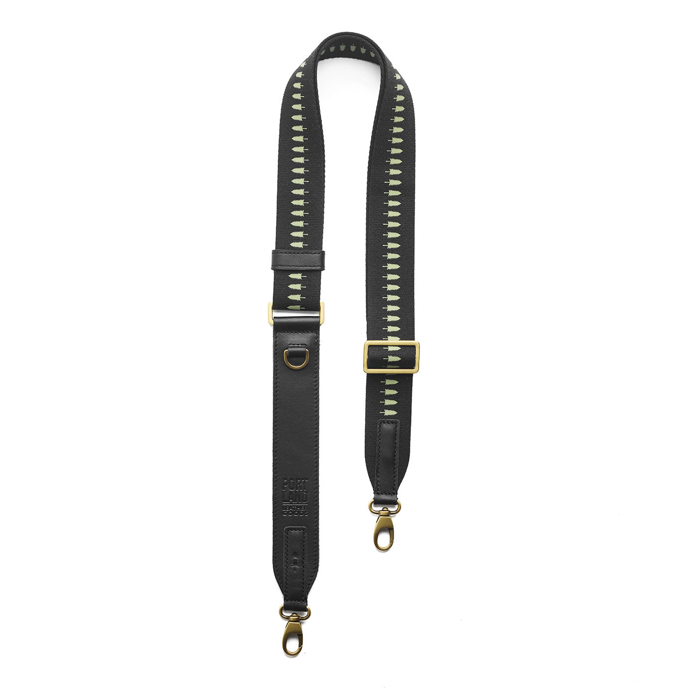 Black | Black strap with repeating tree pattern and brass-toned hardware
