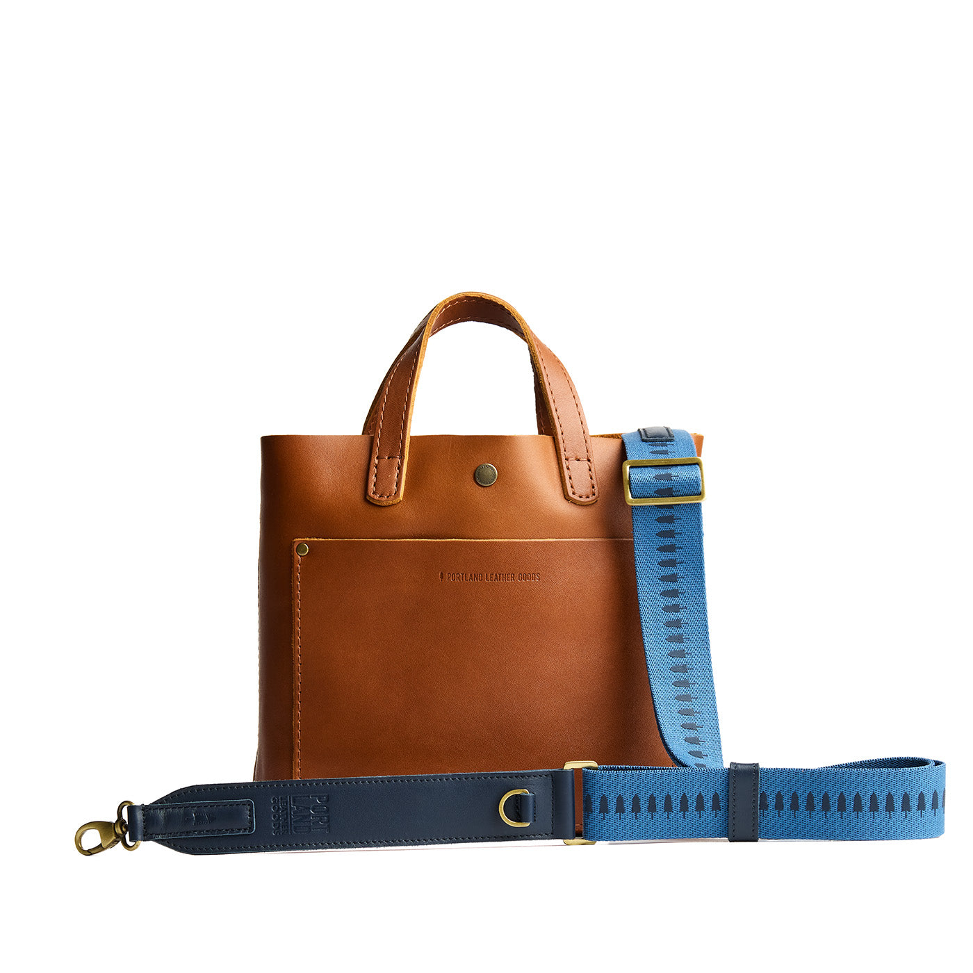Fog Lake | Blue strap with repeating tree pattern and brass-toned hardware
