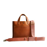 Rosy Haze | Pink strap with repeating tree pattern and brass-toned hardware