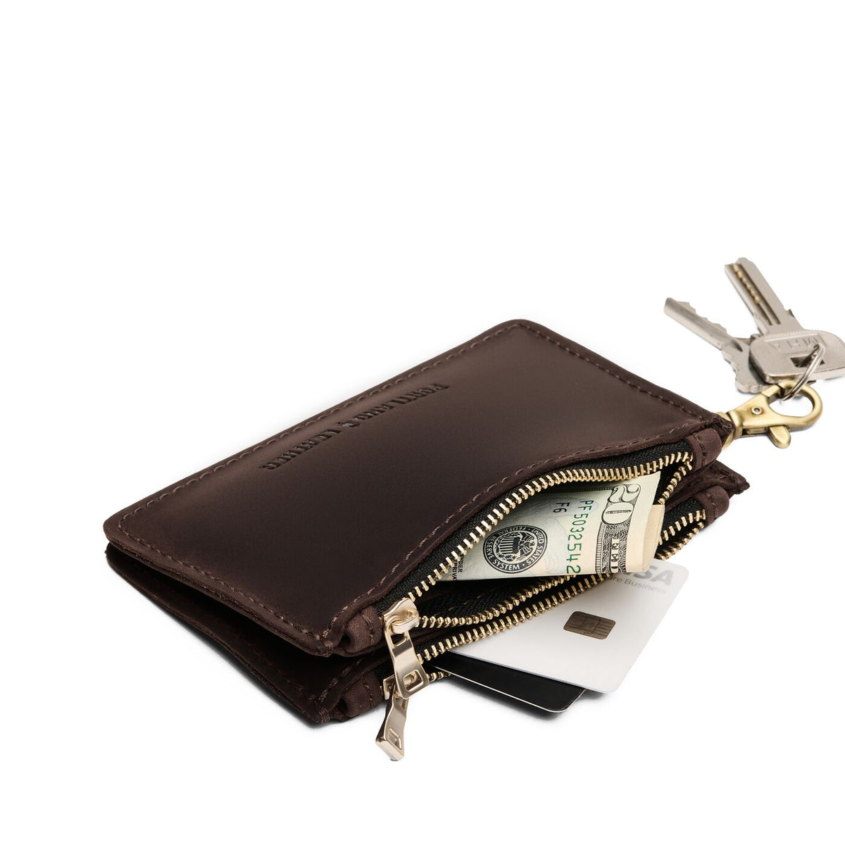 Moose | Leather double zip wallet with keychain clasp and zipper, shown with keys and a dollar bill tucked inside, on a clean white background