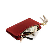 Phoenix | Leather double zip wallet with keychain clasp and zipper, shown with keys and a dollar bill tucked inside, on a clean white background