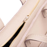 Oatmilk Zipper | Close-up of zipper on midsize crossbody tote with handles and a pocket