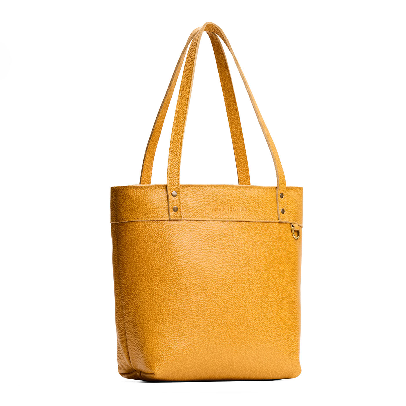 Sunshine*Medium*Zipper | Model wearing leather tote bag with riveted straps and exterior key loop