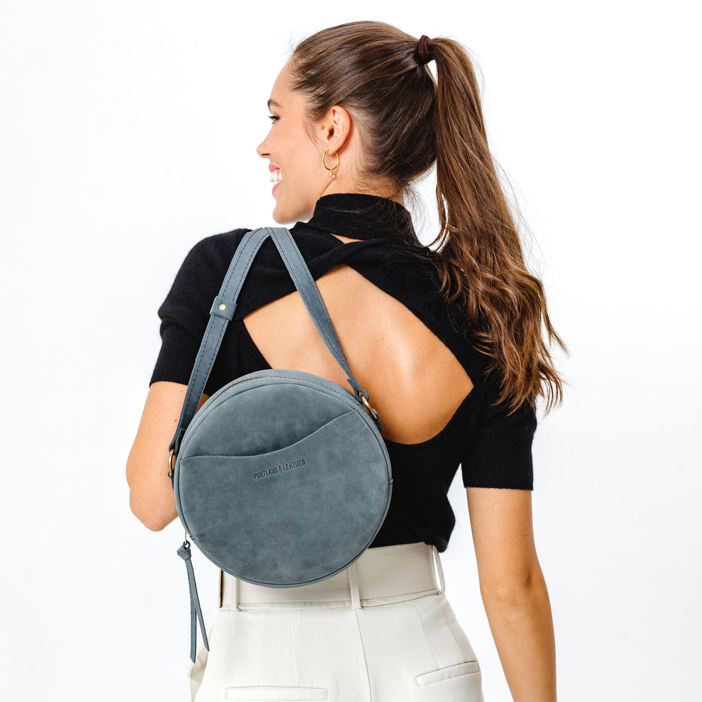 Storm*Large | Circle shaped crossbody bag with top zipper